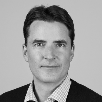 Thomas Laffont's headshot, greyscale